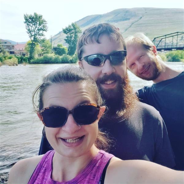 Mrs. Nagel, her husband Dave, and twin brother Michael on a walk by the Clark Fork River. Mrs. Nagel, her husband Dave, and twin brother Michael on a walk by the Clark Fork River.